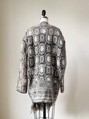 19th century rug pattern jacket with fringe