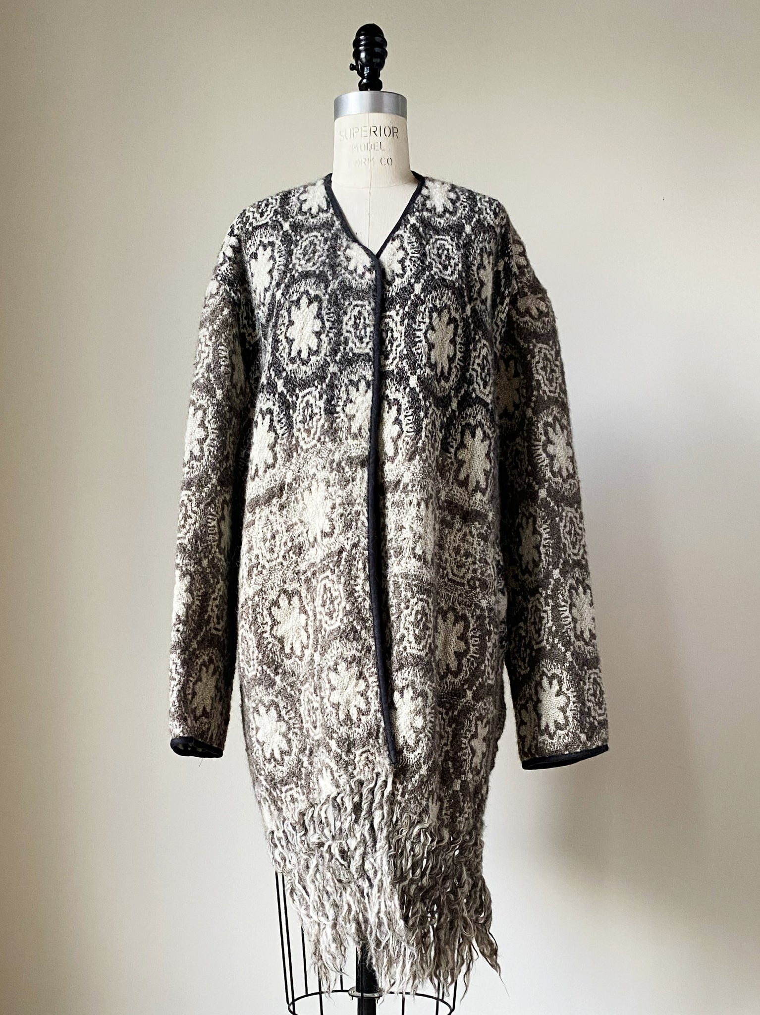 19th century rug pattern jacket with fringe