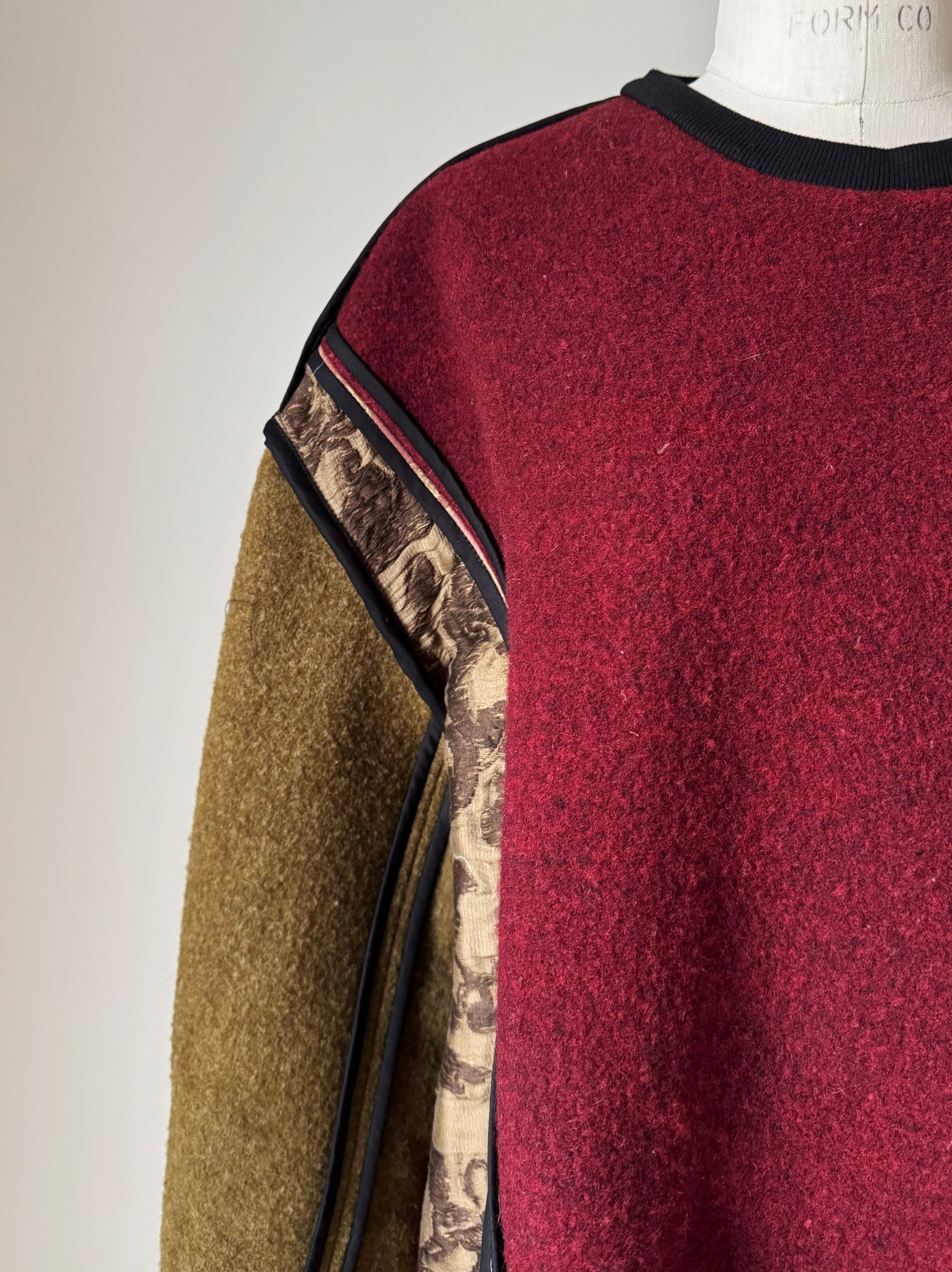 patched vintage army blanket and archival jacquard sweatshirt