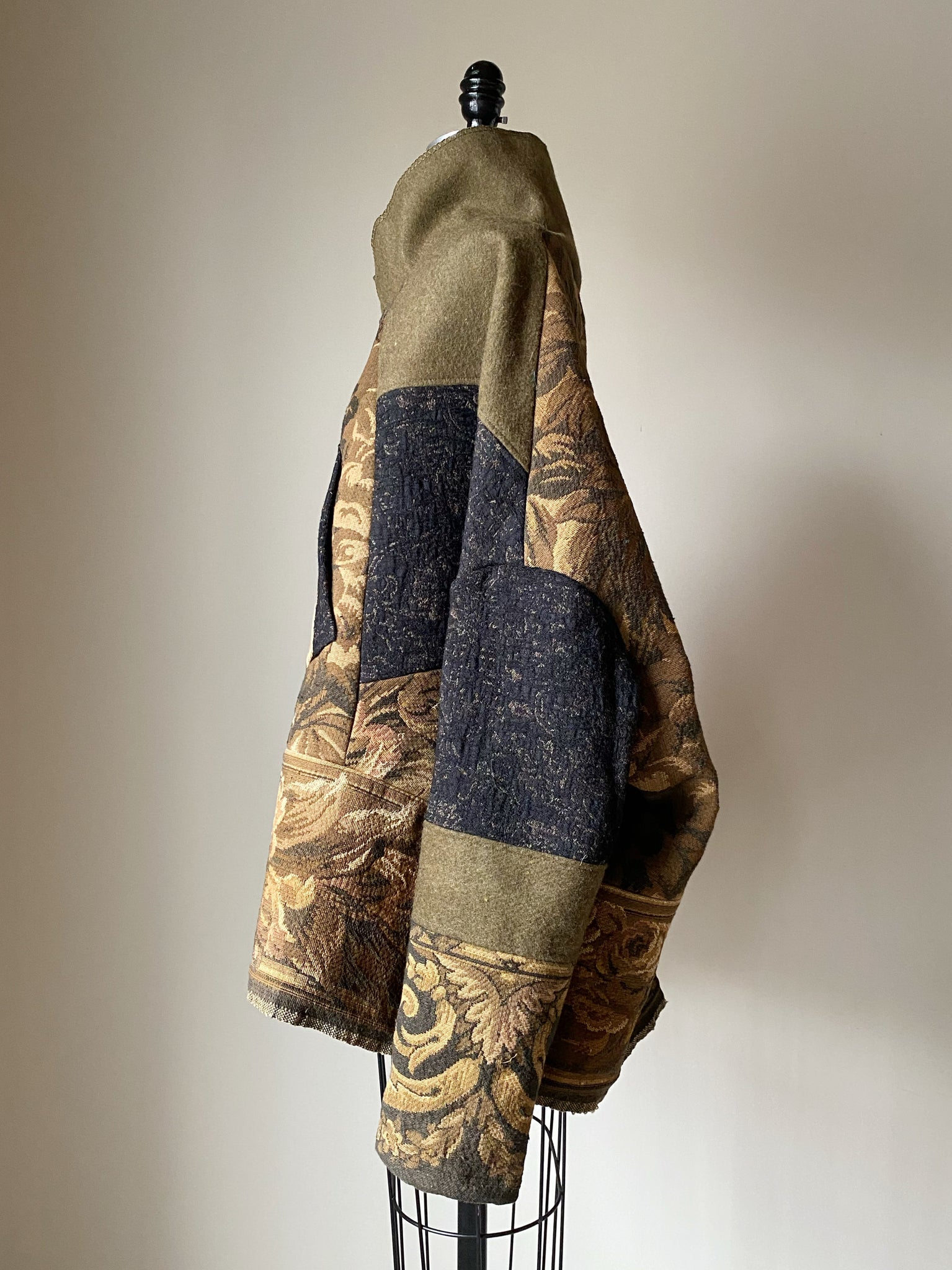 tapestry and army blanket cocoon