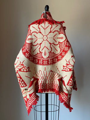 red and off white coverlet cocoon
